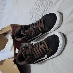 Brown and white vans